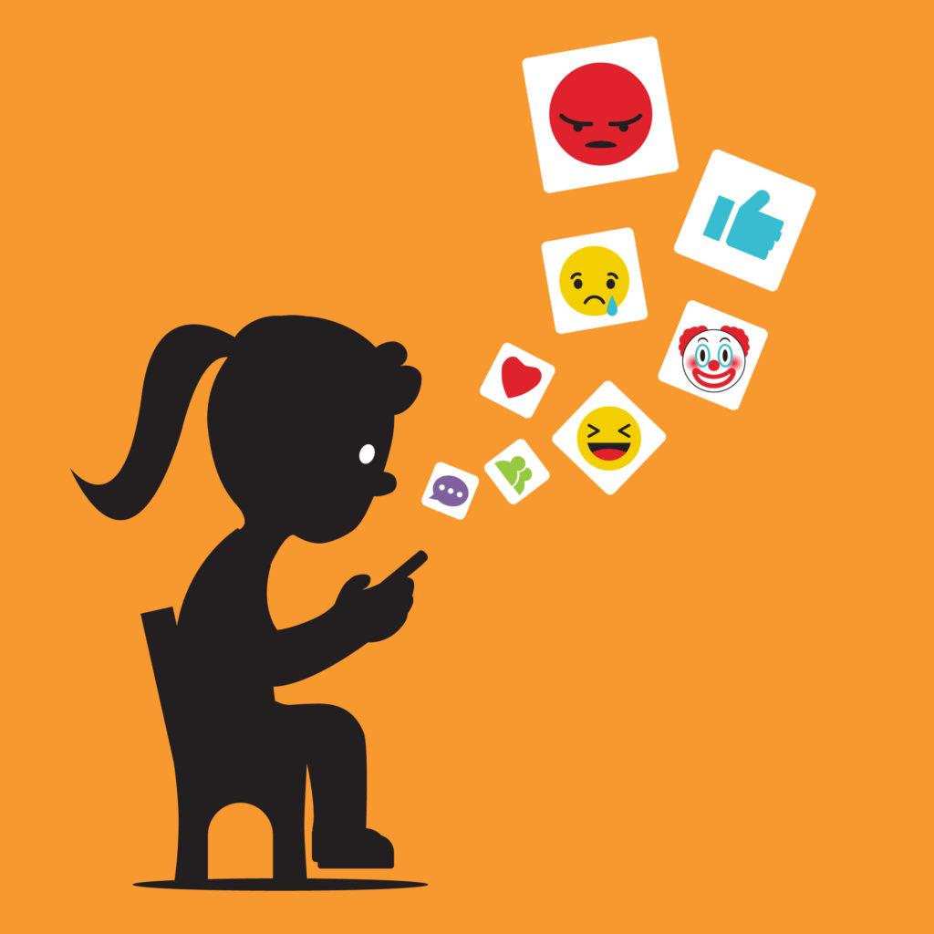 A silhouette of a young person sitting scrolling through social media on their phone with positive and negative icons floating out of it