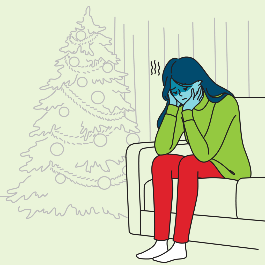 An illustration of a young woman sitting alone with her head in her hands with a pale Christmas tree behind her.