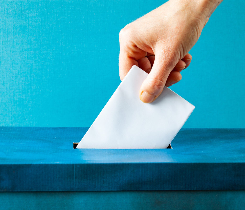 A person voting