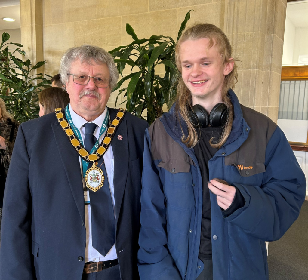 A photo of Somerset Council Chair Mike Best and Somerset Member of Youth Parliament Blake.